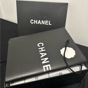 Chanel White and Black Sneaker with Silver Accents
